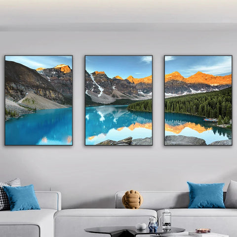 A breathtaking vista of turquoise glacial waters reflecting the jagged, snow-capped peaks of the Valley of the Ten Peaks at dawn.